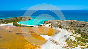 Aerial view of Puerto Rico. Faro Los Morrillos de Cabo Rojo. Playa Sucia beach and Salt lakes in Punta Jaguey. photo