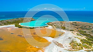 Aerial view of Puerto Rico. Faro Los Morrillos de Cabo Rojo. Playa Sucia beach and Salt lakes in Punta Jaguey.