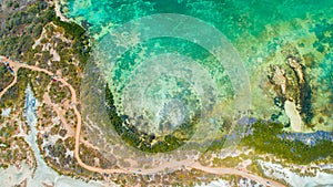 Aerial view of Puerto Rico. Faro Los Morrillos de Cabo Rojo. Playa Sucia beach and Salt lakes in Punta Jaguey.