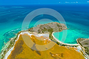 Aerial view of Puerto Rico. Faro Los Morrillos de Cabo Rojo. Playa Sucia beach and Salt lakes in Punta Jaguey.