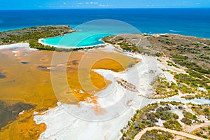 Aerial view of Puerto Rico. Faro Los Morrillos de Cabo Rojo. Playa Sucia beach and Salt lakes in Punta Jaguey.