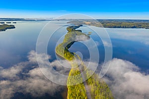 Aerial view of Pulkkilanharju Ridge, Paijanne National Park, southern part of Lake Paijanne. Landscape with drone. Fog, Blue lakes