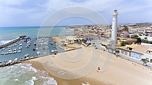 Aerial view of Punta Secca in Sicily, beach, port, lighthouse . photo