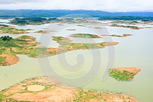 Aerial view of Queen Sirikit Dam in Nan Province, Nan River, Thailand. Rainy season.