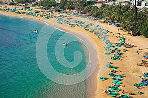 Aerial view of Quy Nhon beach with curved shore line in Binh Dinh province, Vietnam