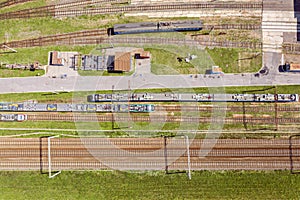 Aerial view of railroad tracks with passenger commuter trains. top view