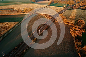 Aerial view of railway countryside landscape at sunset