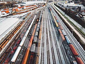 Aerial view of railway lines with cargo trains parked on the lines
