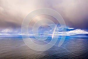 Aerial view of an rainbow above the Atlantic Ocean in Donegal - Ireland