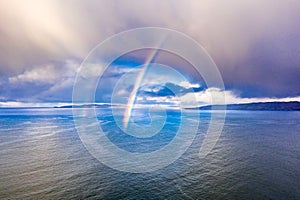 Aerial view of an rainbow above the Atlantic Ocean in Donegal - Ireland