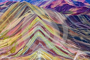 Aerial view of the Rainbow Mountains Montana de Siete Colores in Peru with Vinicunca in the center