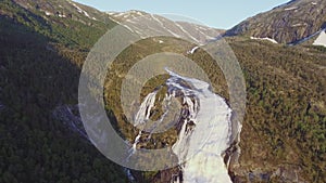 Aerial view of Rapid Stunning Waterfall in Husedalen Valley, Norway. Summer time. NyastÃ¸lsfossen