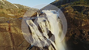 Aerial view of Rapid Stunning Waterfall in Husedalen Valley, Norway. Summer time. NykkjesÃ¸yfossen