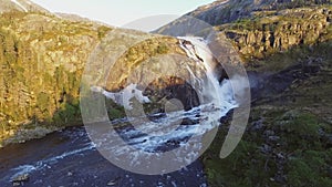 Aerial view of Rapid Stunning Waterfall in Husedalen Valley, Norway. Summer time. NykkjesÃ¸yfossen