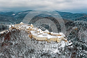 Aerial view of Rasnov Fortress near Brasov in Romania after a snowfall