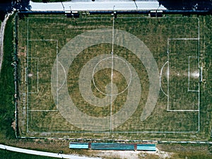 Aerial view of real soccer pitch, football field drone pov