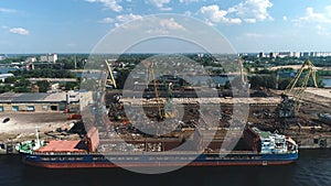 Aerial view on Recycling, loading scrap metal in the ship. Russia. Port of samara