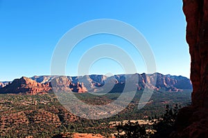 An aerial view of the red sandstone mountainous landscape of Sedona, Arizona, USA