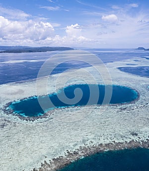 Aerial View of Reefs and Blue Hole in Raja Ampat