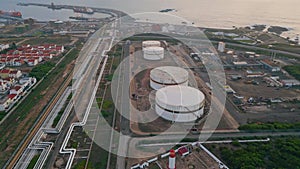 Aerial view refinery storage construction at sea. Oil fuel facility in port town