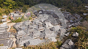 Aerial view of the remote Nuogang Dai village in Lancang, Yunnan - China photo