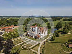 Aerial view of Renaissance Basedow castle with a surrounding landscape park in Mecklenburg-Vorpommern