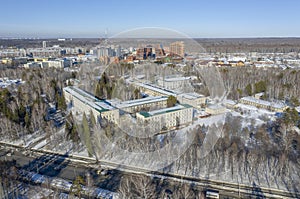 Aerial view of the Research Institutes of Novosibirsk Akademgorodok surrounded by forest in spring