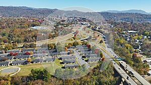 Aerial view of residential apartments close to highway road in Asheville city in North Carolina. New family condos near