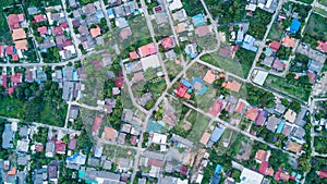 Aerial view of residential houses and driveways.