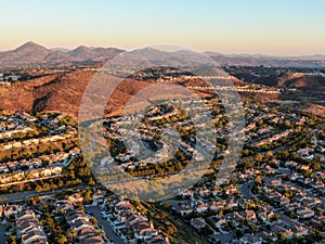 Aerial view of residential modern subdivision during sunset