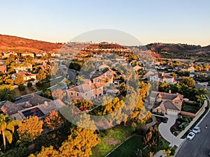 Aerial view of residential modern subdivision during sunset