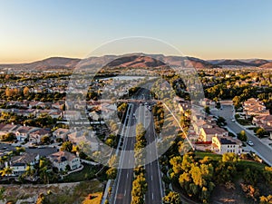 Aerial view of residential modern subdivision during sunset