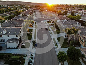 Aerial view of residential modern subdivision during sunset