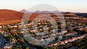 Aerial view of residential modern subdivision during sunset