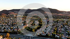 Aerial view of residential modern subdivision during sunset