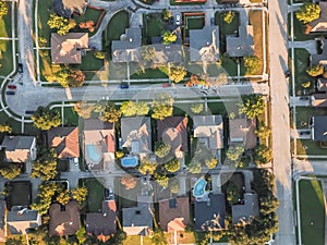 Aerial view residential subdivision with swimming pool and dead-end street near Dallas, Texas photo