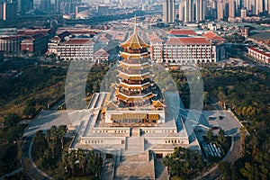 Aerial view of a retro style traditional Chinese pagoda tower, Jimei Tower in the Civic Park in Jimei District and city skyline