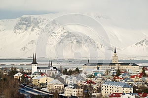 Aerial view of Reykjavik from Perlan, snow capped mountains in winter, Iceland