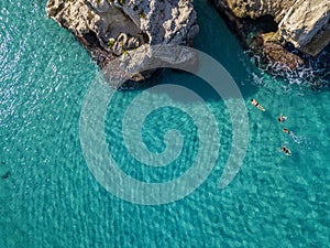 Aerial view of the Riaci rocks, Riaci beach near Tropea, Calabria. Italy. Bathers who swim and snorkel photo