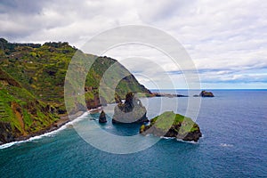Aerial view of Ribeira da Janela volcanic sea stacks in Madeira island, Portugal photo