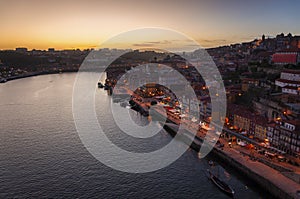 Aerial view of the Ribeira Neighbourhood and the Douro River with Rabelo Boats, in the city of Porto