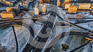 Aerial view of Riga elevated road junction and interchange overpass at winter sunset time