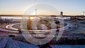 Aerial view of Riga elevated road junction and interchange overpass at winter sunset time