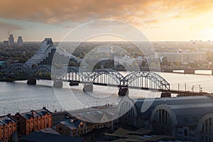 Aerial view of Riga National Library of Latvia and Railway Bridge at sunset - Riga, Latvia