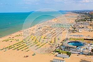 Aerial view of Rimini beach with people and blue water. Summer vacation concept. photo