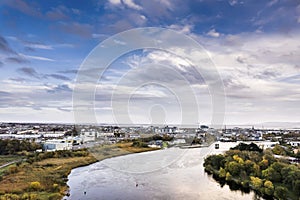 Aerial view on River Corrib and Galway city, Ireland. Warm sunny day with stunning cloudy sky. Irish nature landscape scene