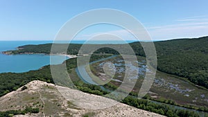 Aerial view of a river that flows into the sea