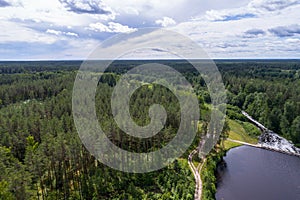 Aerial view of river among the forest. Summer nature landscape.