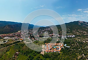 Aerial view of River side streets of Mtskheta village in Georgia with Mtkvari river. View of the city from the north, from