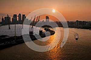 Aerial view of River Thames, North Greenwich and the Docklands at sunset